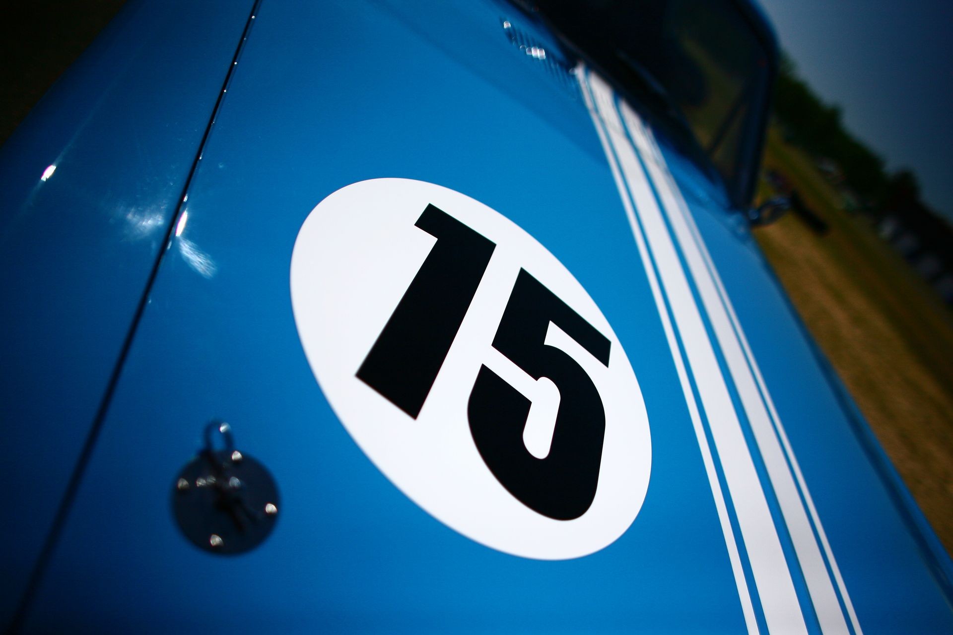 Close-up view of a decal on a blue race car. Close-up view of a decal on a blue race car.
